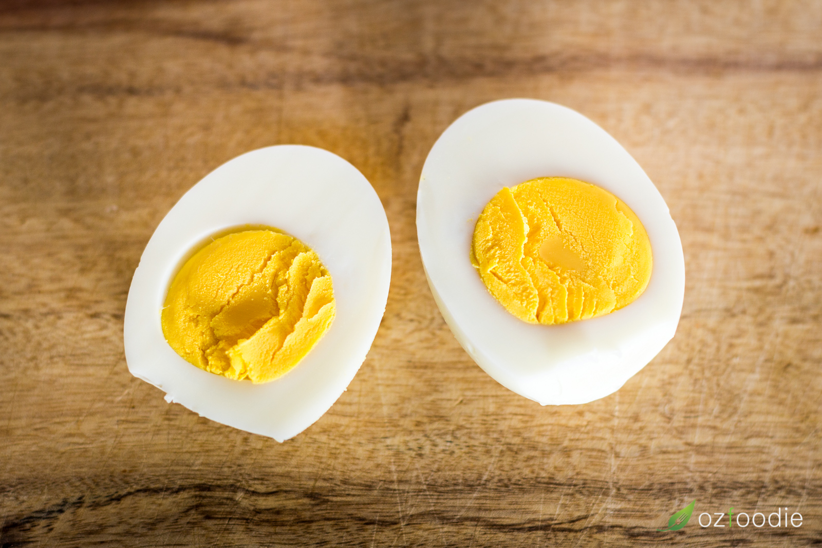 A hard-boiled egg, peeled and halved